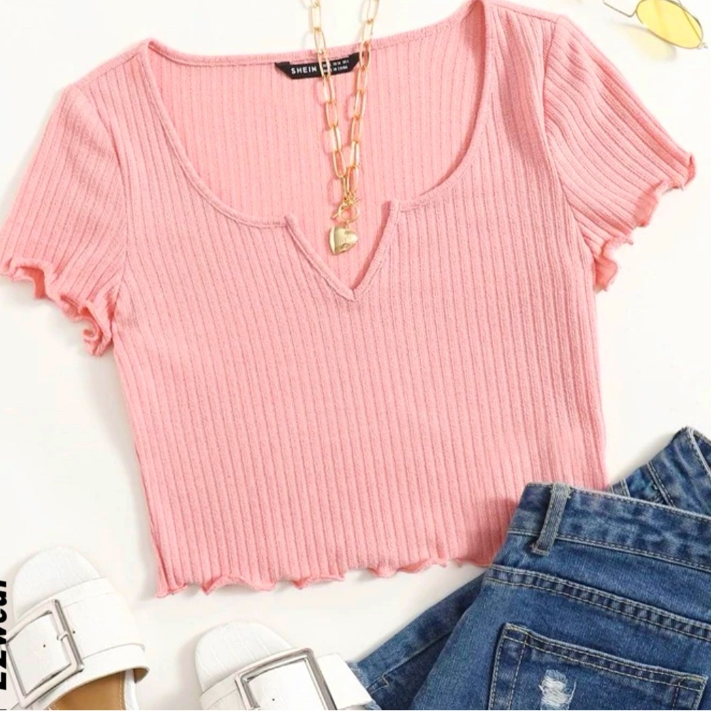 It’s a baby pink crop top